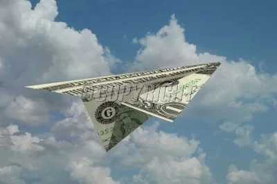 paper-airplane-made-out-money-image.webp