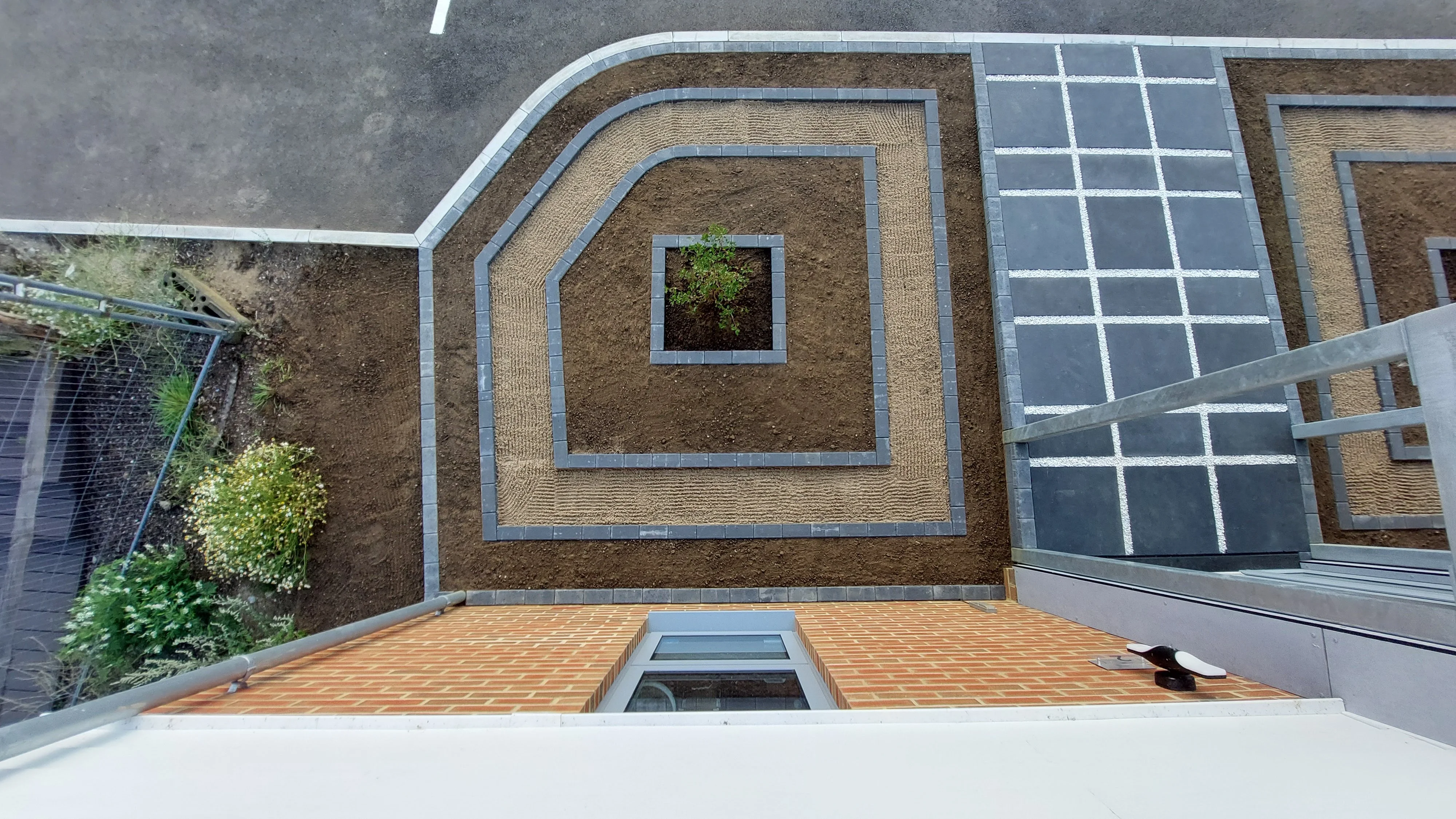 Hard landscaping completed - left side top view